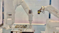 Mitsubishi&rsquo;s Assista cobot and RV-7FRL and RV-8CRL industrial robots in a complex path screw-driving assembly operation at IMTS 2022.